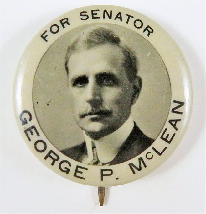 Campaign pin for Senator George McLean with a photo of a moustached man and words: "For Senator, George P. McLean"